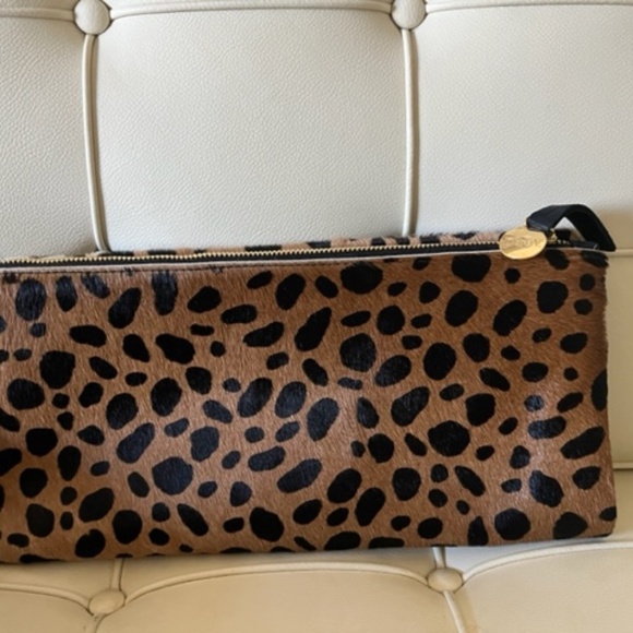 Iconic Clare V leopard calf hair foldover clutch and dustbag. Like New.